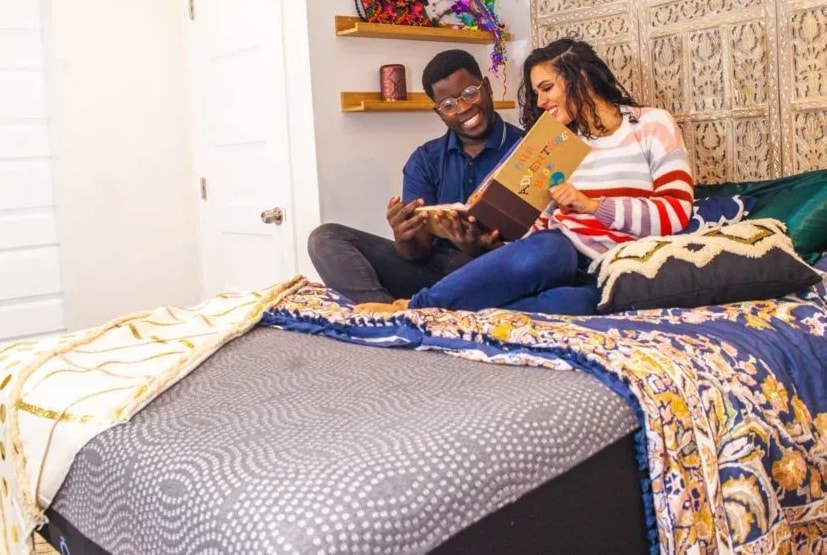 Man & Woman Reading Together on Allume Mattress - O by Neven