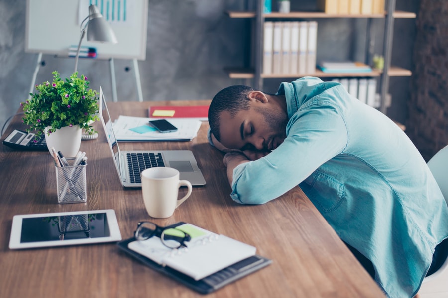 Tired Man Asleep at Desk - Sleep & Productivity - O by Neven